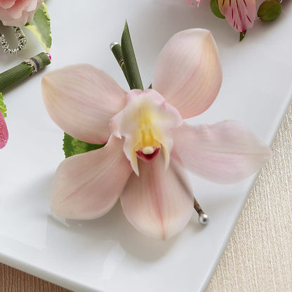 Pink Cymbidium Boutonniere –  Kalas Events Inc, Orlando FL